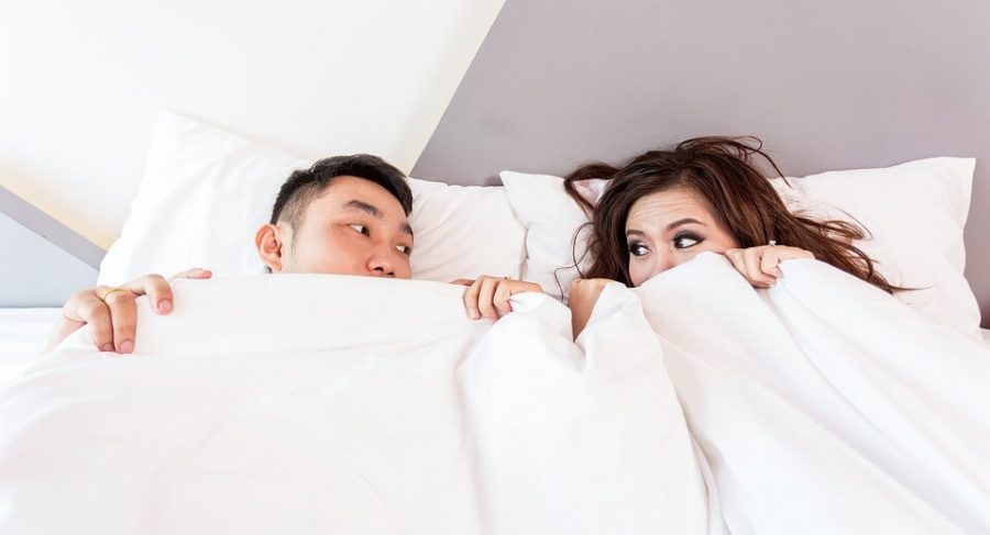 Couple in White Sheets