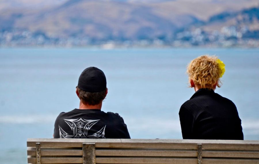 Couple sitting apart