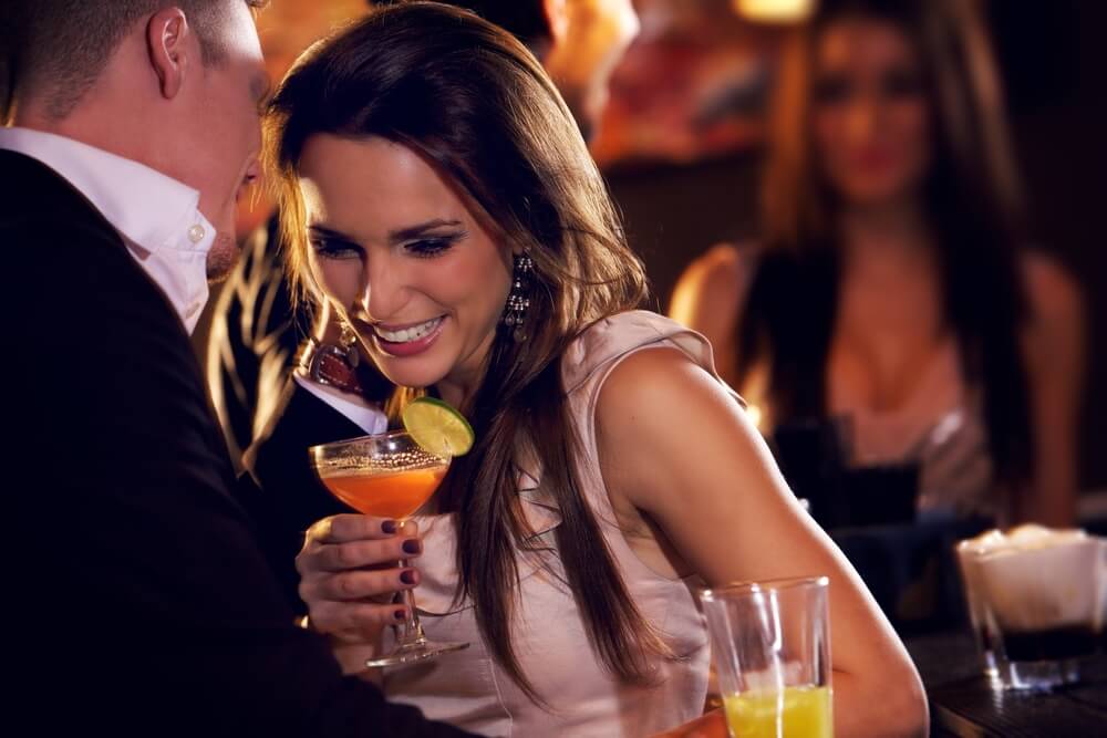 couple enjoying cocktail